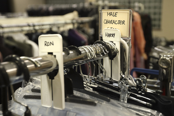 Racks of costumes in the wardrobe studio.