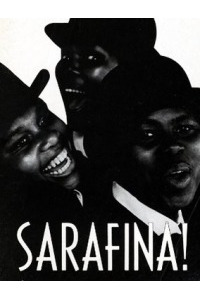 Black & white photo of 3 Black women smiling in friendship